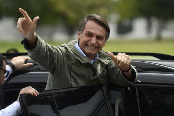 O candidato do PSL foi eleito a Presidência do Brasil com 55,63% dos votos válidos/Foto: Mateus Pimenta/AFP