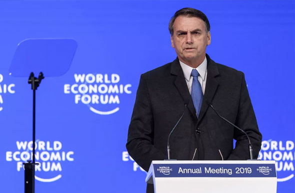 Foto: Fabrice Coffrini/AFP/ O presidente Jair Bolsonaro durante discurso nesta terça (22), no Fórum Econômico Mundial, em Davos